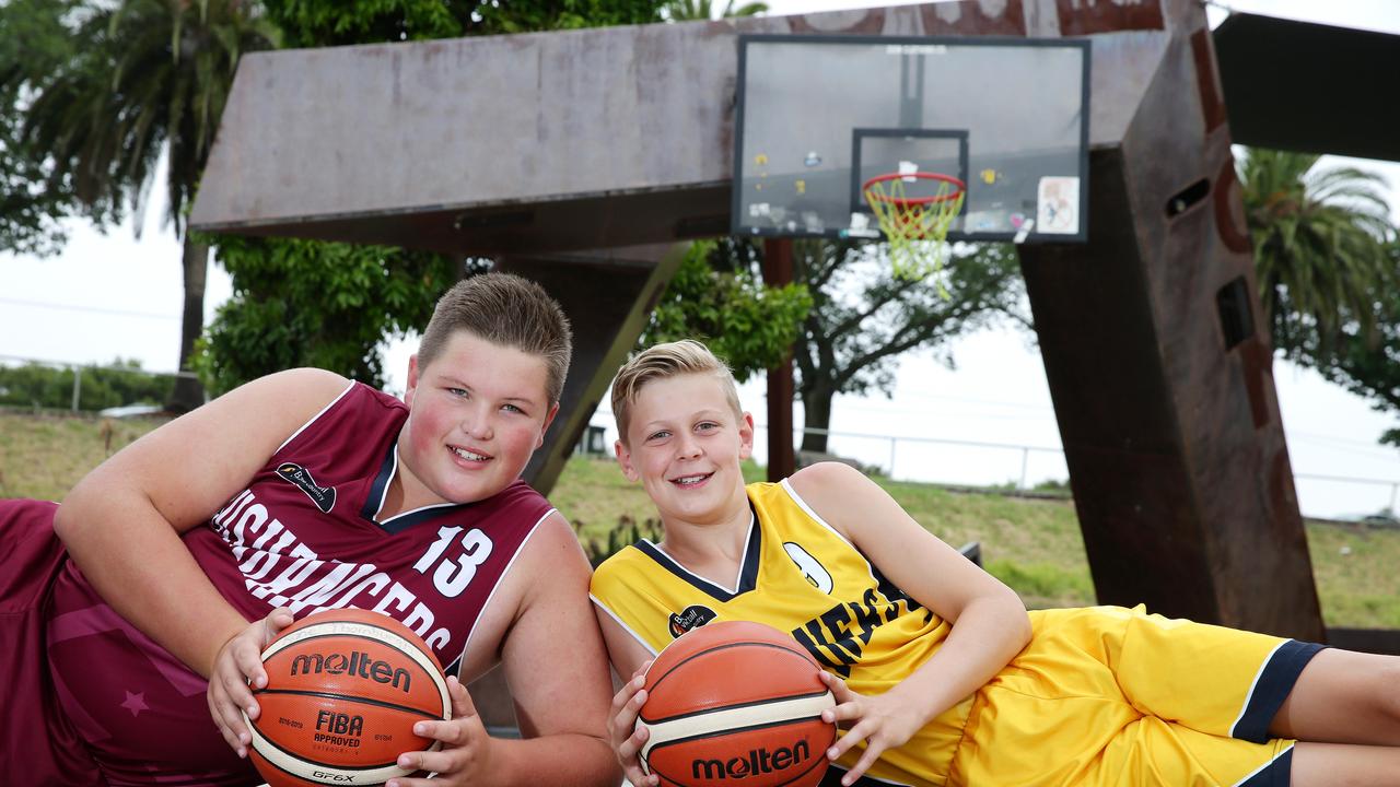 Joe Pike (right) was selected to represent Australia in basketball. Picture: Alison Wynd