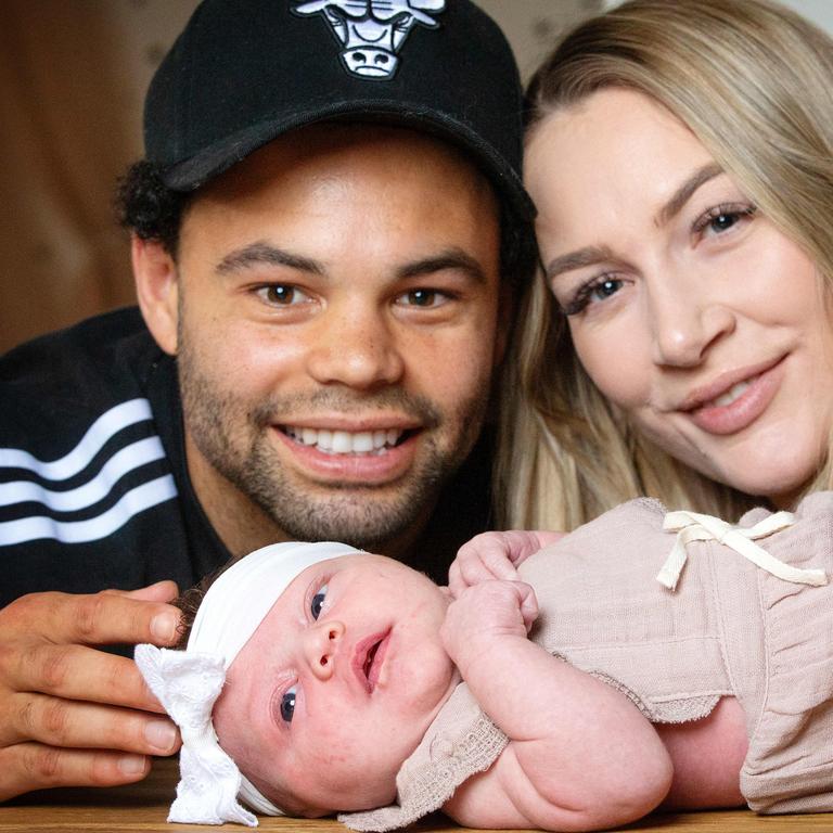 Logan Shine and Jason Johannisen and their daughter Lola Blair. Picture: Mark Stewart