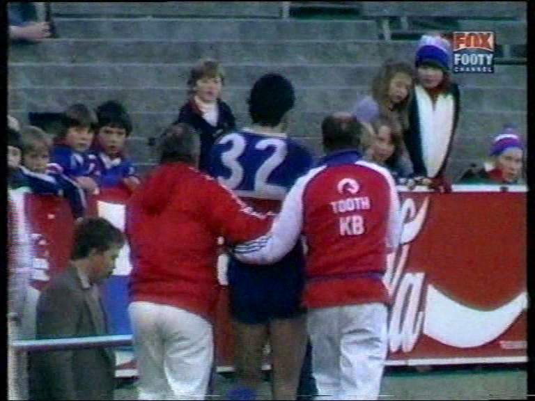 1982-Footscray-v-Melbourne-Ian-Dunstan-walks-off-ground.png