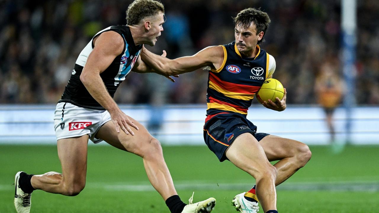 Luke Nankervis and [PLAYERCARD]Dan Houston[/PLAYERCARD] face off. Picture: Mark Brake/Getty Images