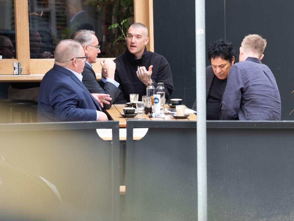 Foxtel boss Patrick Delany, Fox Sports managing director Steve Crawley, Dustin Martin, Fox Footy commentator Jack Riewoldt and Martin's manager Ralph Carr.