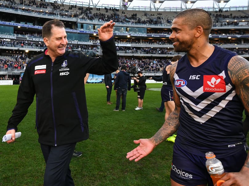 Ross Lyon and Bradley Hill celebrate the win over Geelong earlier this month.