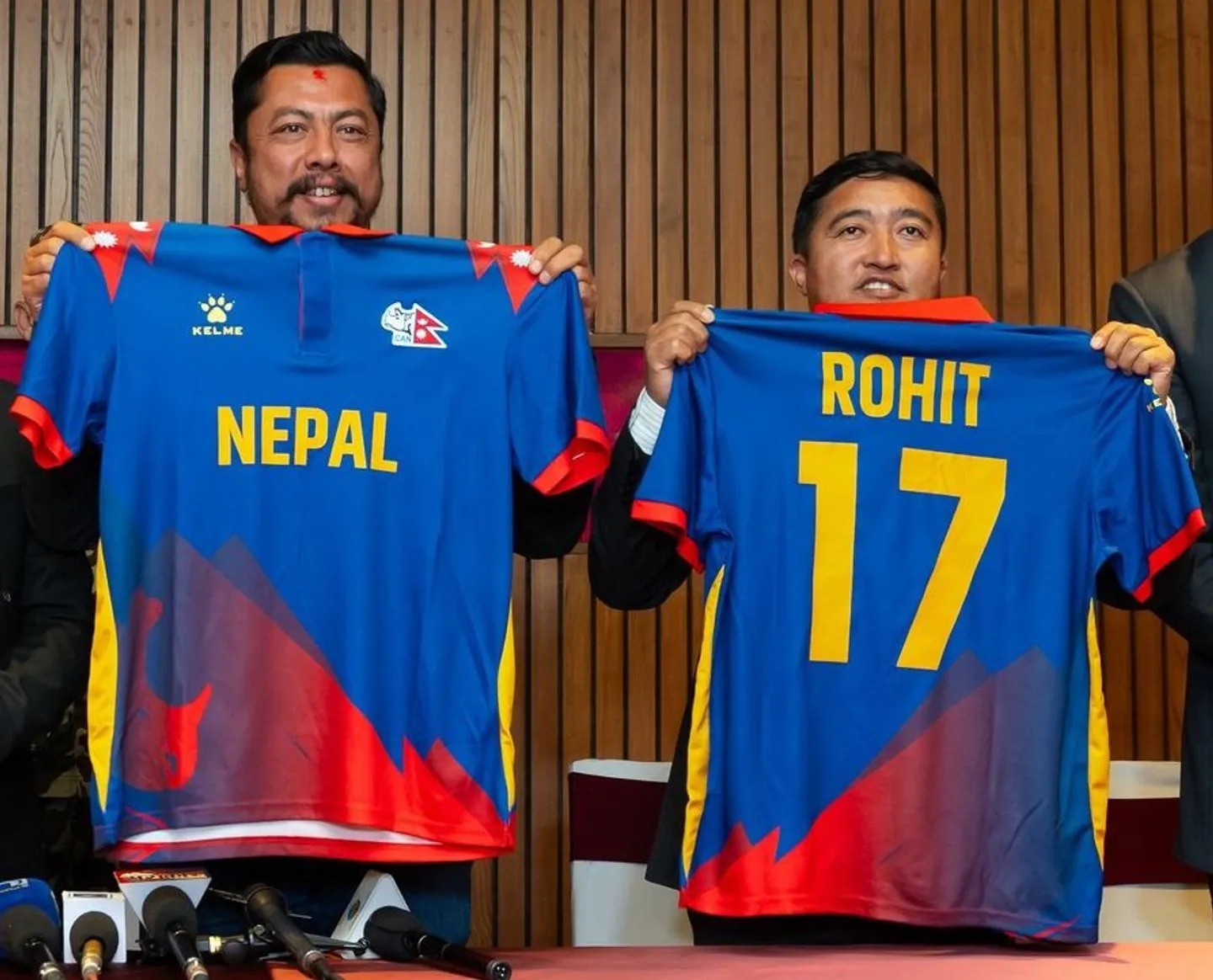 May be an image of 2 people and text that says 'KELME NEPAL ROHIT 17 TL'