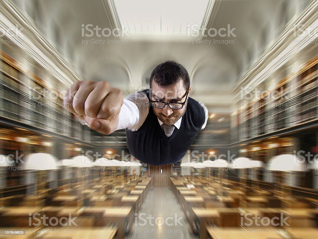 superman-nerd-at-the-library-flying-picture-id157649605