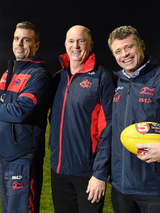 Phil Smyth, centre, pictured with Norwood coach Jarrod Cotton and CEO James Fantasia at the club’s oval on The Parade in August. Picture: Tom Huntley