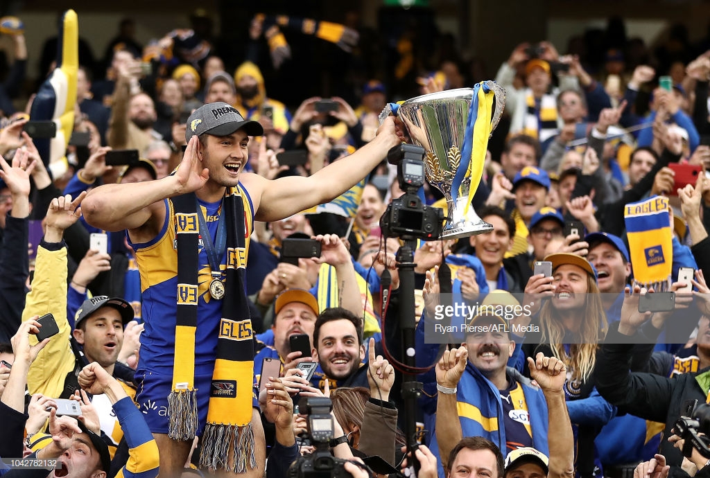 tom-barrass-of-the-eagles-celebrates-with-the-premiership-cup-after-picture-id1042782132