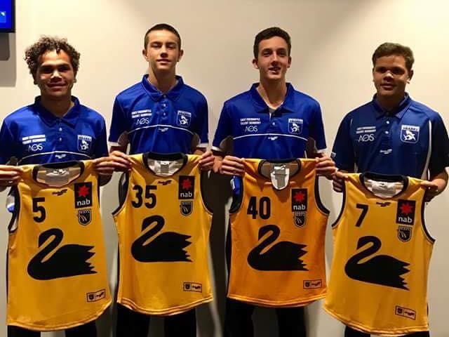 Jack Carroll (second from left) has been likened to Collingwood captain Scott Pendlebury.