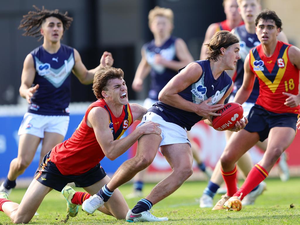 Murphy Reid of Victoria Metro and Charlie Nicholls of South Australia contest during the Under 18 National Championships on Sunday. Picture: Sarah Reed/AFL Photos via Getty Images.