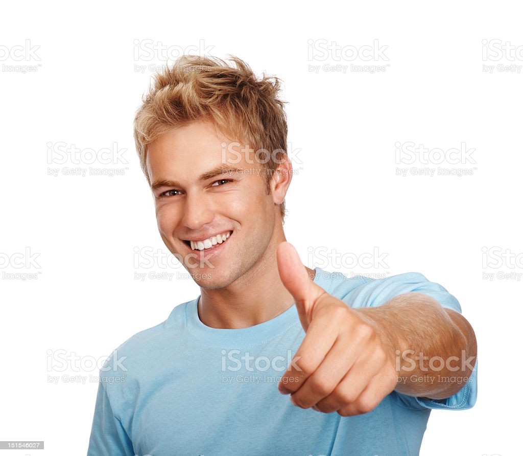 happy-young-guy-showing-thumbs-up-sign-picture-id151546027