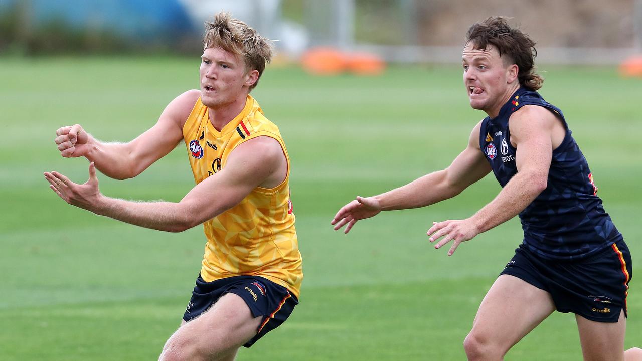 [PLAYERCARD]Fischer McAsey[/PLAYERCARD] (left) at Crows training earlier this year. Picture: Sarah Reed