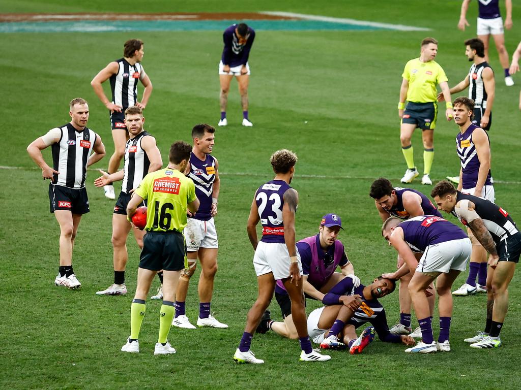 Brandon Walker of the Dockers is seen injured in Round 18, 2023. Picture: Dylan Burns/AFL Photos via Getty Images.