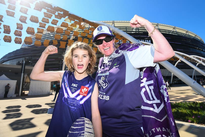 Passionate fans show their support before the clash with Collingwood.