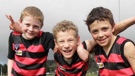 Josh Rentsch (middle) with his cousins Edward and Duncan after an under 12s game when they were 8.