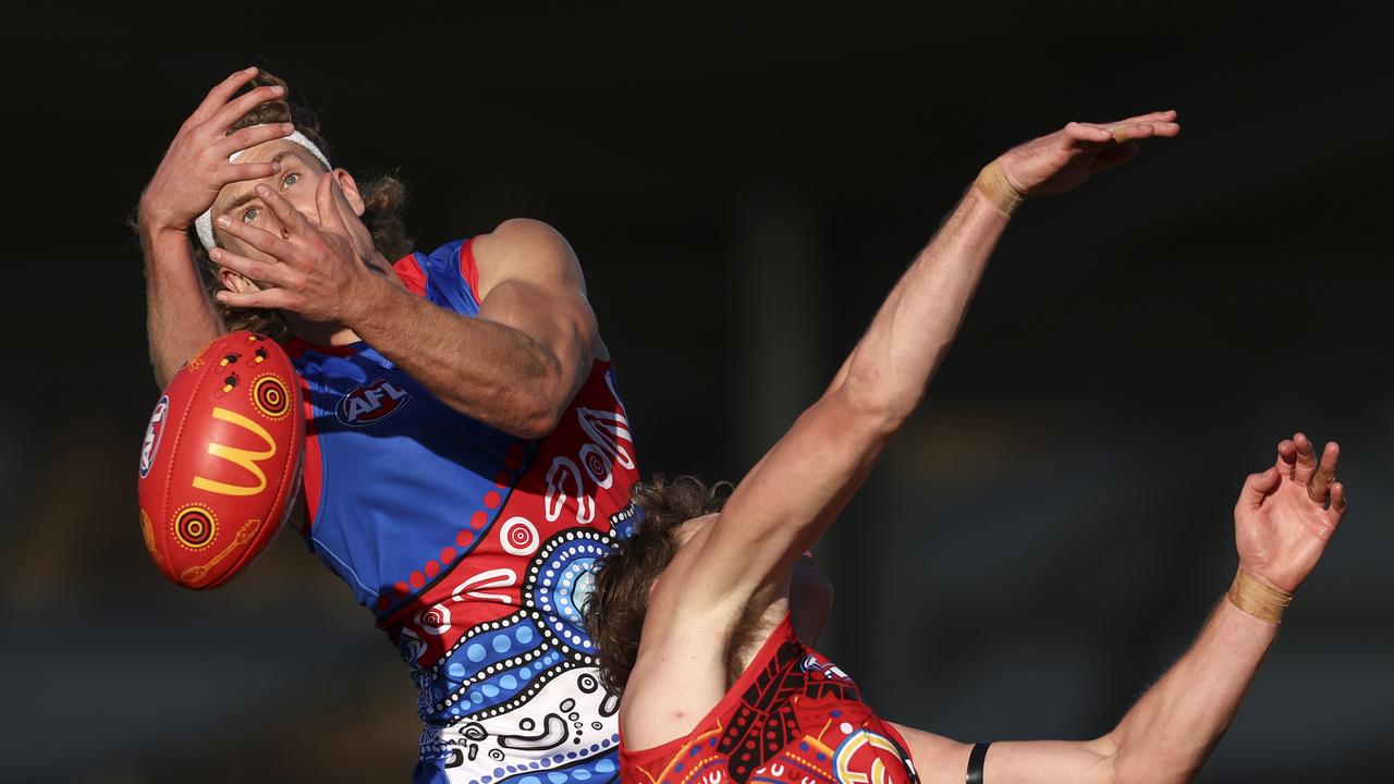 [PLAYERCARD]Aaron Naughton[/PLAYERCARD] flies for a mark. Picture: Martin Keep/Getty Images