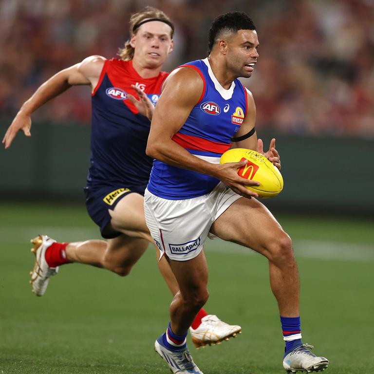 Johannisen dashes clear of Charlie Spargo.