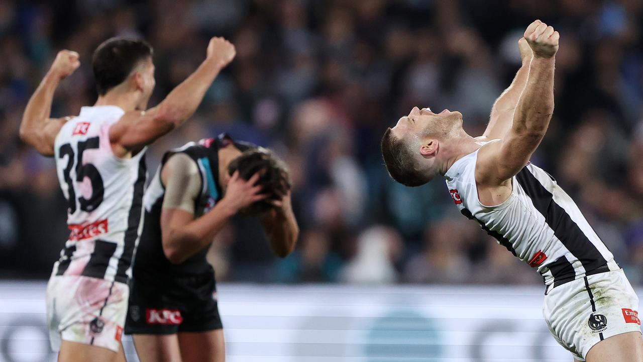 [PLAYERCARD]Taylor Adams[/PLAYERCARD] and Nick Daicos react on the final siren. Picture: Sarah Reed/AFL Photos