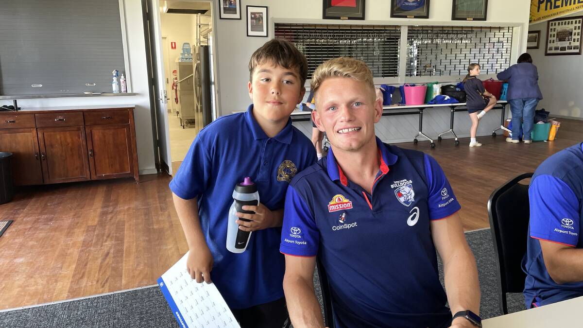 Sebastopol grade five Brock has a chat with Bulldogs' star [PLAYERCARD]Adam Treloar[/PLAYERCARD], who says it is great to chat more individually with young fans. Picture by Melanie Whelan