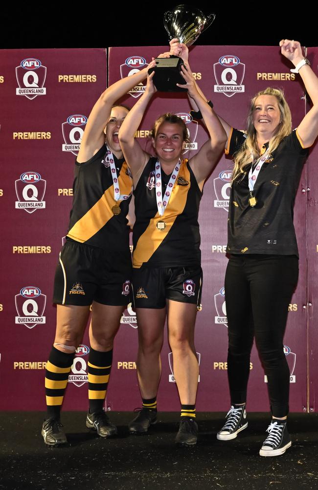 Rachel Kelly (co-caption) and Chantelle Brown (co-coach and co-captain) with premiership winning co-coach Katie Patison.