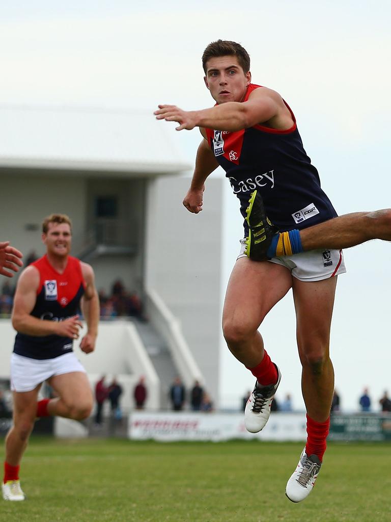 Brenton Hillard (right) playing for the Casey Demons.