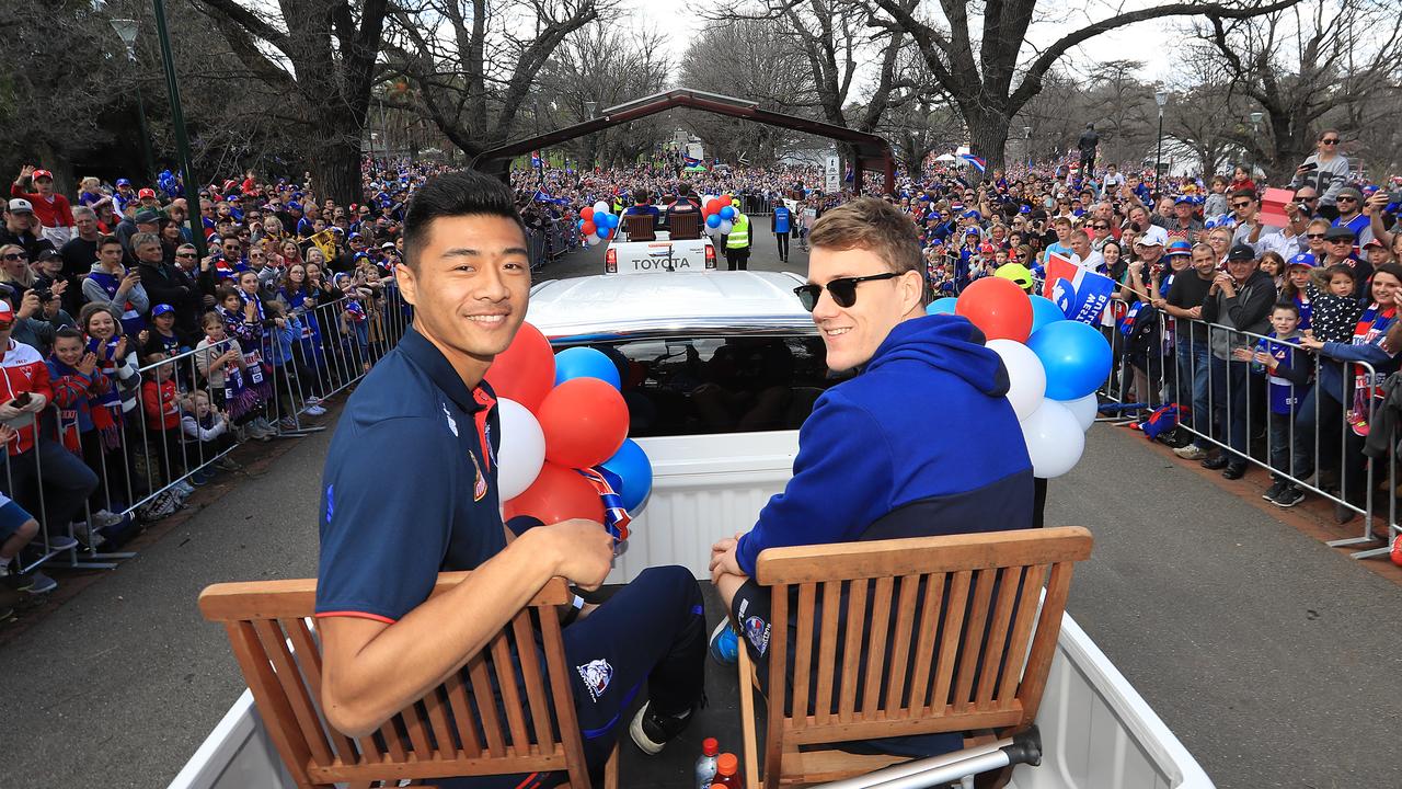 \Western Bulldogs' [PLAYERCARD]Jackson Macrae[/PLAYERCARD] and [PLAYERCARD]Lin Jong[/PLAYERCARD] at the 2016 Grand Final Parade. Picture: Alex Coppel.