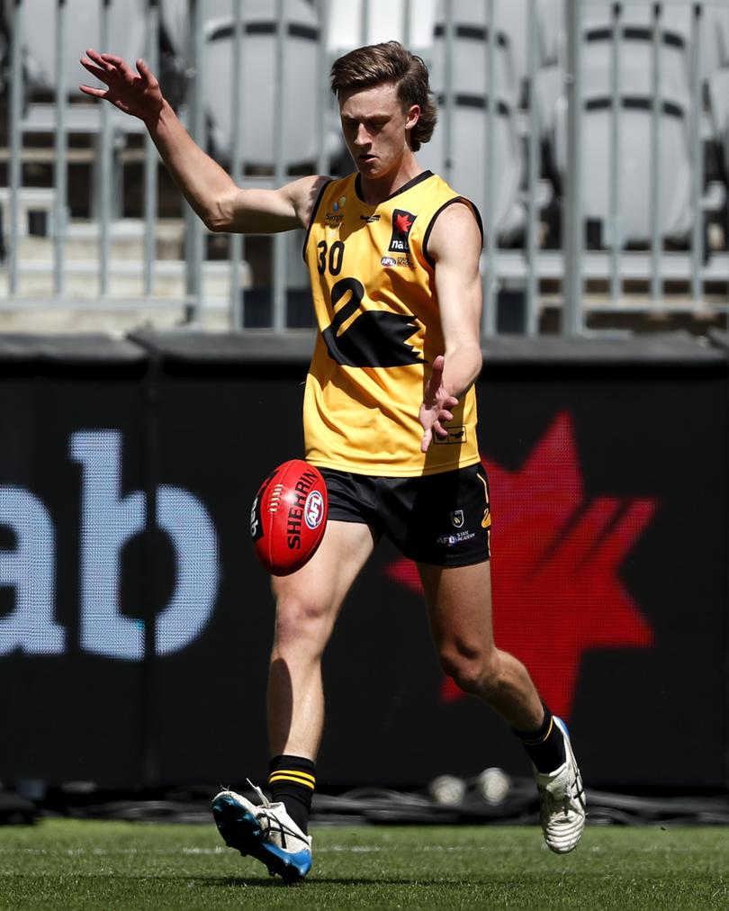 PERTH, AUSTRALIA - SEPTEMBER 25: Jye Amiss of Western Australia kicks the ball during the 2021 U19 Championship match between Western Australia and South Australia at Optus Stadium on September 25, 2021 in Perth, Australia. (Photo by Dylan Burns/AFL Photos via Getty Images)