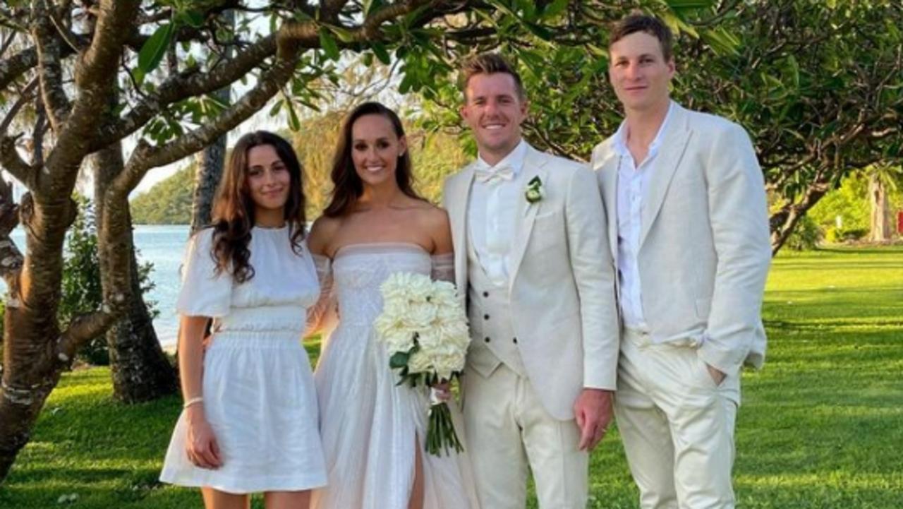 [PLAYERCARD]Jordan Dawson[/PLAYERCARD], far right, at [PLAYERCARD]Luke Parker[/PLAYERCARD]'s wedding on Orpheus Island.