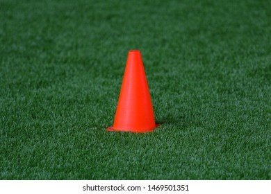 orange-football-cones-on-green-260nw-1469501351.jpg