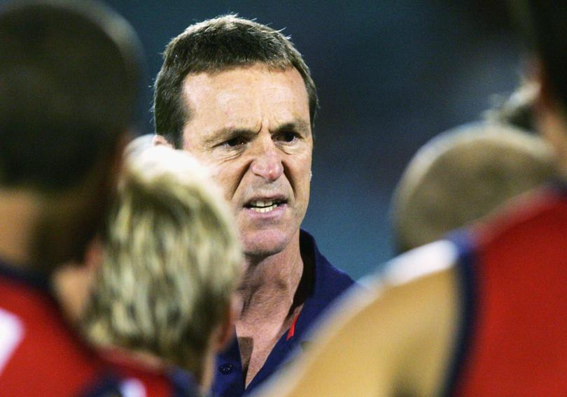 Demons coach Neale Daniher addresses his players.