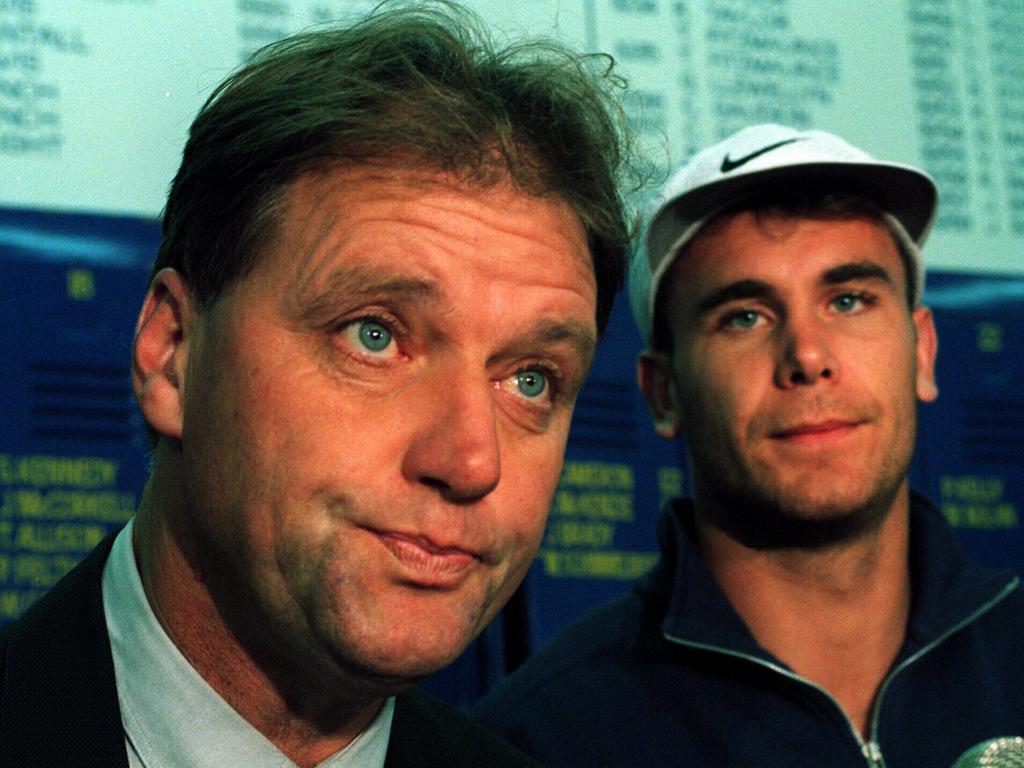 Greg Miller with a young Wayne Carey at North Melbourne.