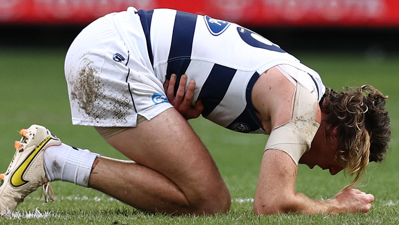 [PLAYERCARD]Mark Blicavs[/PLAYERCARD] after copping a knee to the ribs from Lloyd Meek during a rucking contest. Picture: Michael Klein