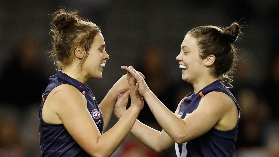 Jasmine-Garner-celebrates-a-goal-with-Ellie-Blackburn-during-the-AFLW-State-of-Origin-match-between-Victoria-and-the-Allies-on-September-2-2017.jpg