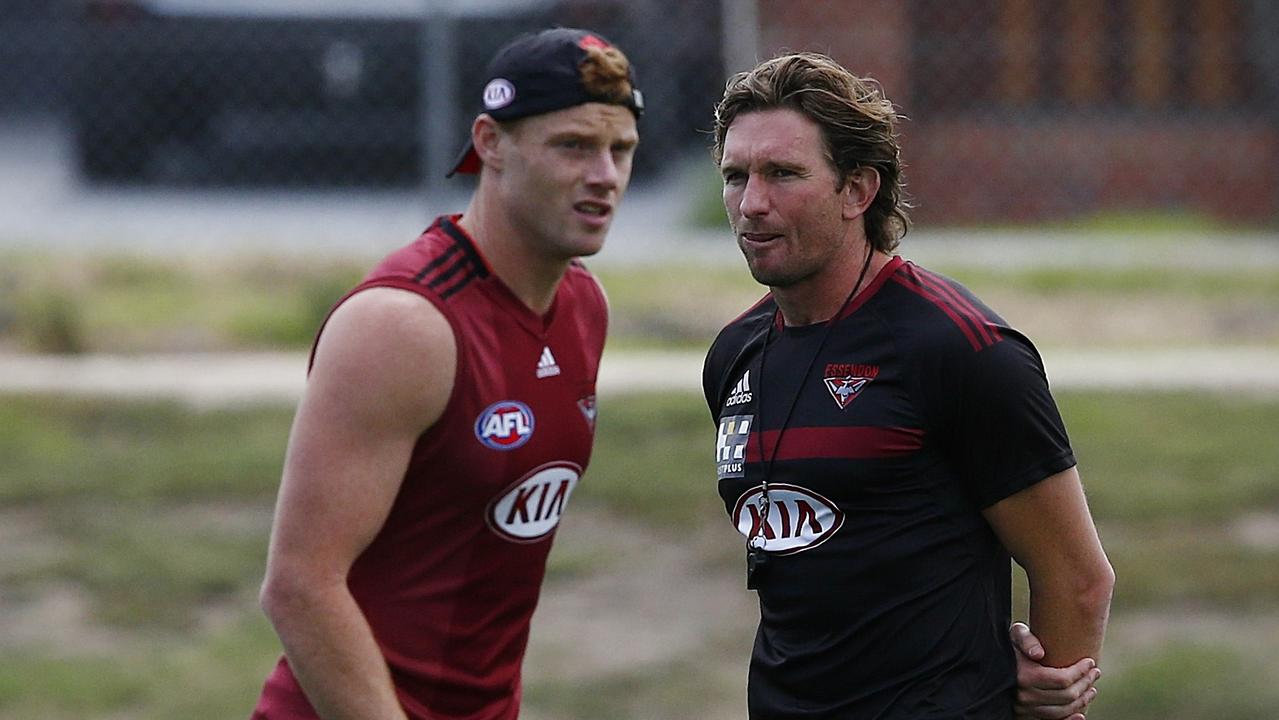 [PLAYERCARD]Adam Cooney[/PLAYERCARD] and James Hird at Essendon training. Picture: Wayne Ludbey