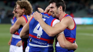 [PLAYERCARD]Marcus Bontempelli[/PLAYERCARD] [PLAYERCARD]Easton Wood[/PLAYERCARD] embrace after the Bulldogs’ preliminary final win.