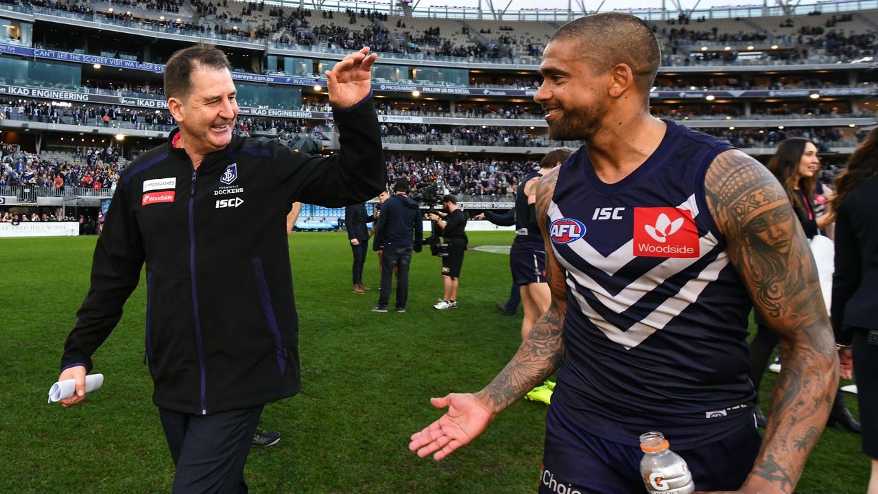 Ross Lyon and Brad Hill enjoy a Fremantle victory in 2019.