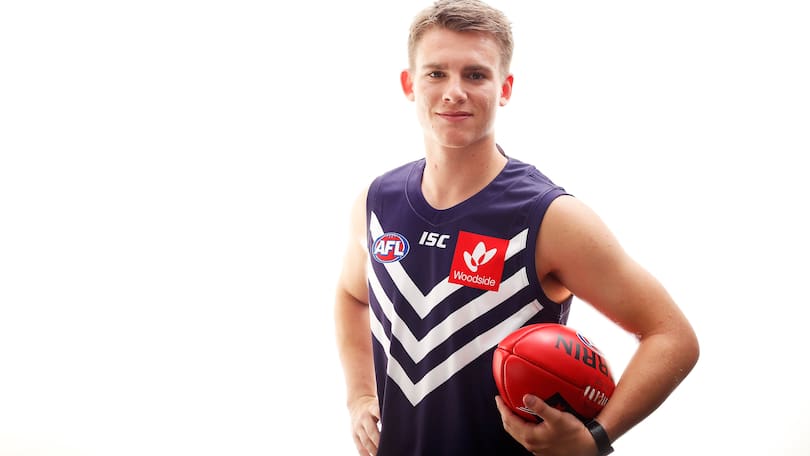 Caleb Serong says he learnt a lot from living with Dockers skipper Nat Fyfe.