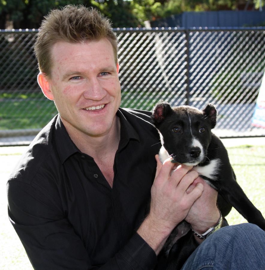 nathan-buckley-and-puppy-buckley.jpg