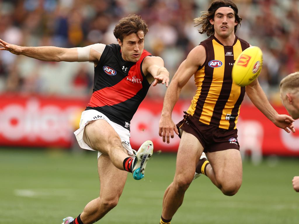 Andy McGrath launches Essendon forward against the Hawks. Picture: Michael Klein