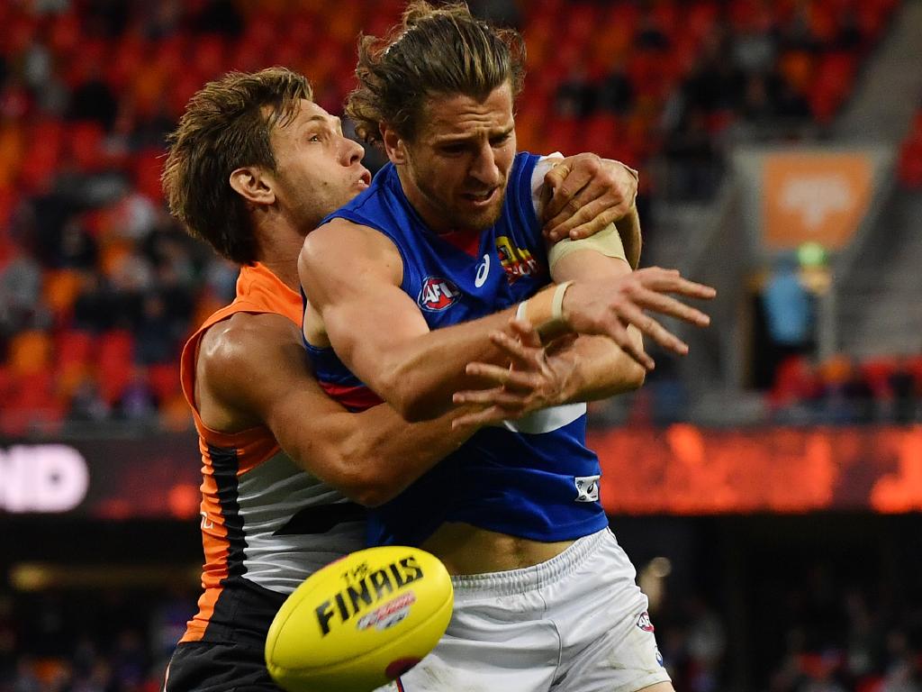 Marcus Bontempelli received little help from teammates after he was constantly pestered by Matt de Boer. Picture: AAP