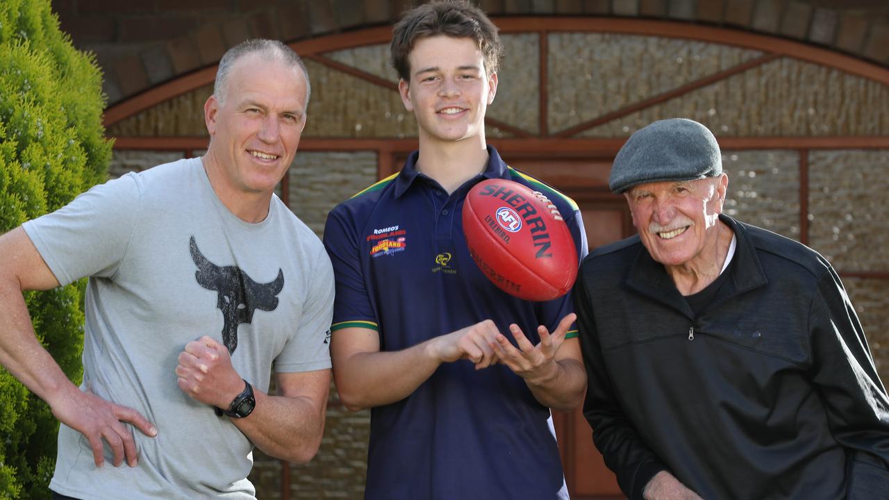 Top South Australian AFL draft prospect Mattaes Phillipou, with his dad, Sam, and grandfather, Peter, who are both former Eagles. Picture: Dean Martin