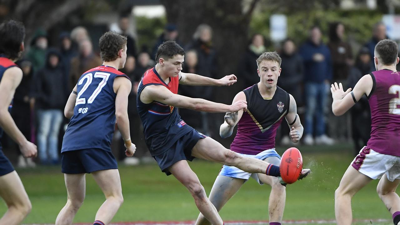 Harrison Oliver gets a kick away for Brighton. Picture: Andrew Batsch