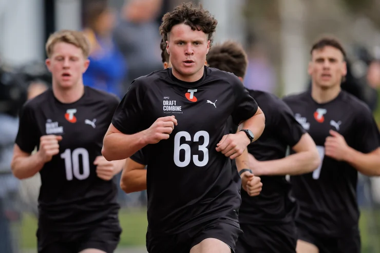 Harvey Langford (centre) makes his mark during AFL combine testing.