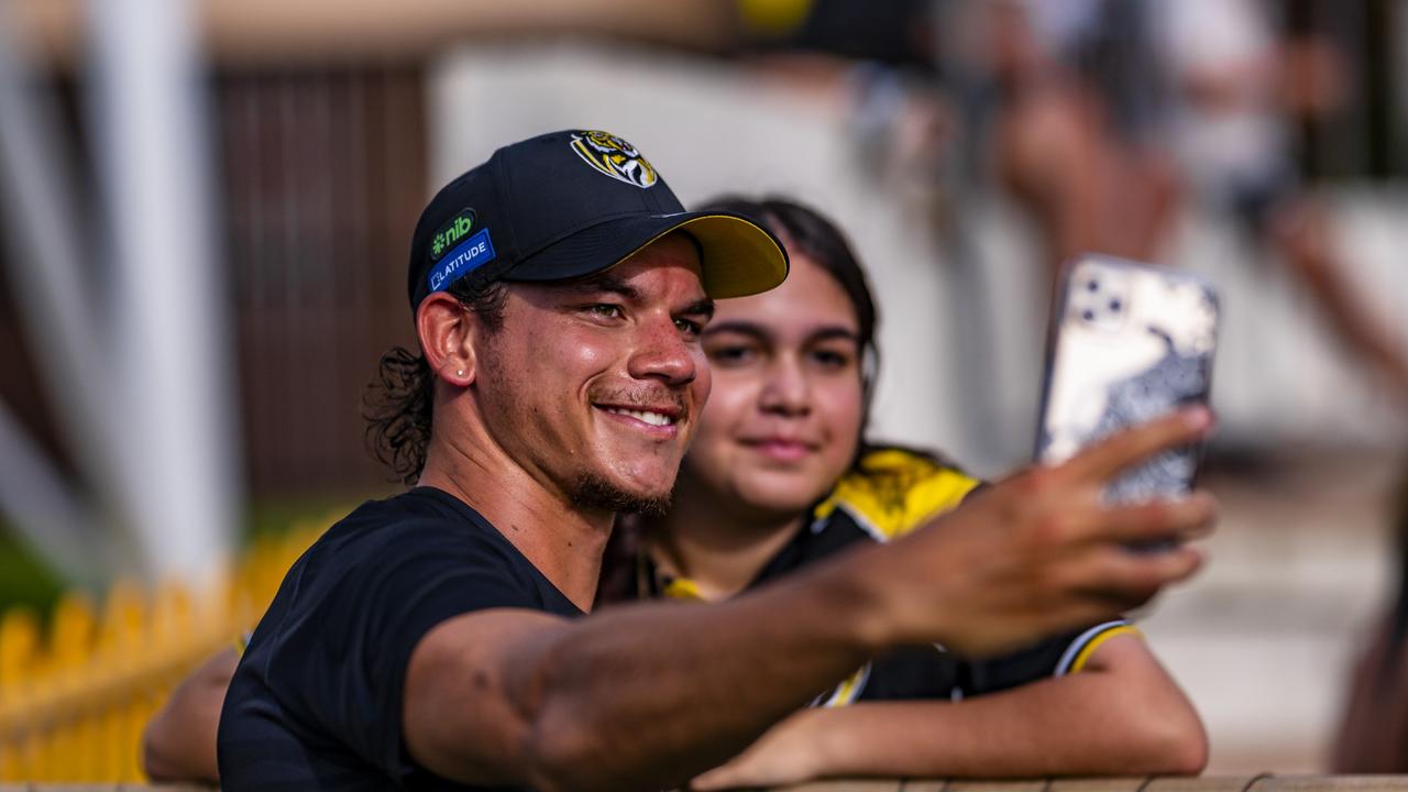 Home town hero [PLAYERCARD]Daniel Rioli[/PLAYERCARD] takes a selfie in Darwin. Picture: Patch Clapp (AFLNT Media).