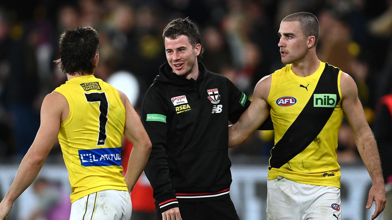 Jack Higgins talks with former Richmond teammates [PLAYERCARD]Liam Baker[/PLAYERCARD] and [PLAYERCARD]Jack Ross[/PLAYERCARD] after the Saints rolled Richmond. Picture: Quinn Rooney/Getty Images