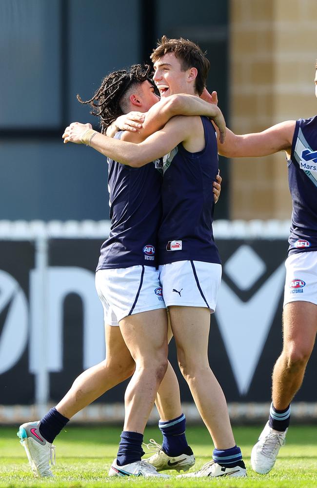 Isaac Kako of Victoria Metro celebrates his goal with Jagga Smith at Alberton Oval on Sunday. Picture: Sarah Reed/AFL Photos via Getty Images.