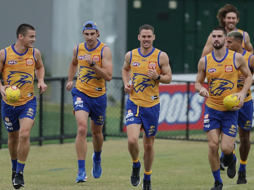 The Eagles runs laps during a West Coast Eagles AFL training session at Mineral Resources Park.