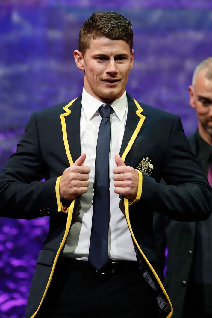 Dayne-Zorko-is-presented-with-his-All-Australian-blazer-on-August-30-2017.jpg