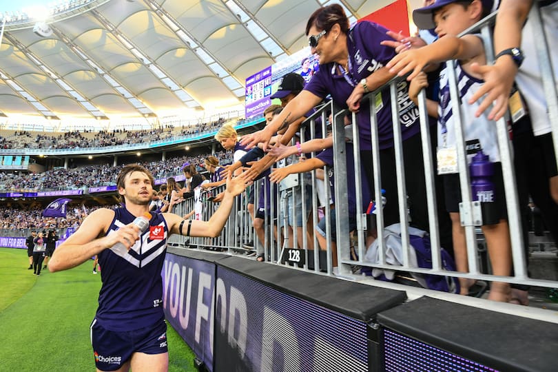 Joel Hamling celebrates with the fans at Optus Stadium.