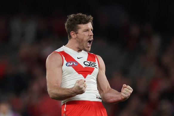 [PLAYERCARD]Luke Parker[/PLAYERCARD] of the Swans celebrates kicking a goal against Essendon