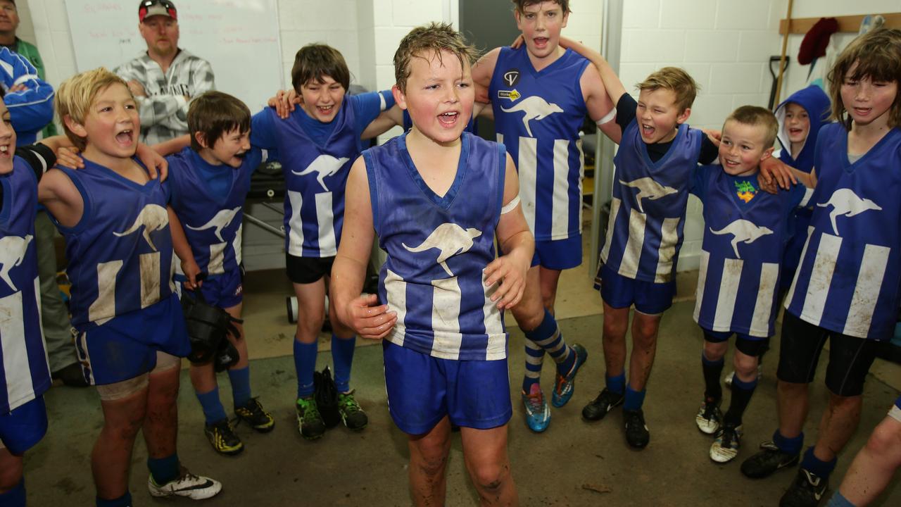 Jack Ginnivan, at 12, celebrates with his teammates after a win in 2014. Picture: Norm Oorloff