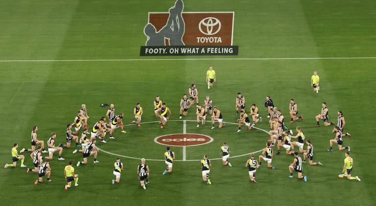 AFL-Kneeling-Before-Game-768x420.jpg